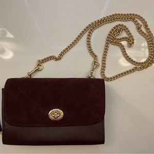 Burgundy Coach Crossbody with gold chain